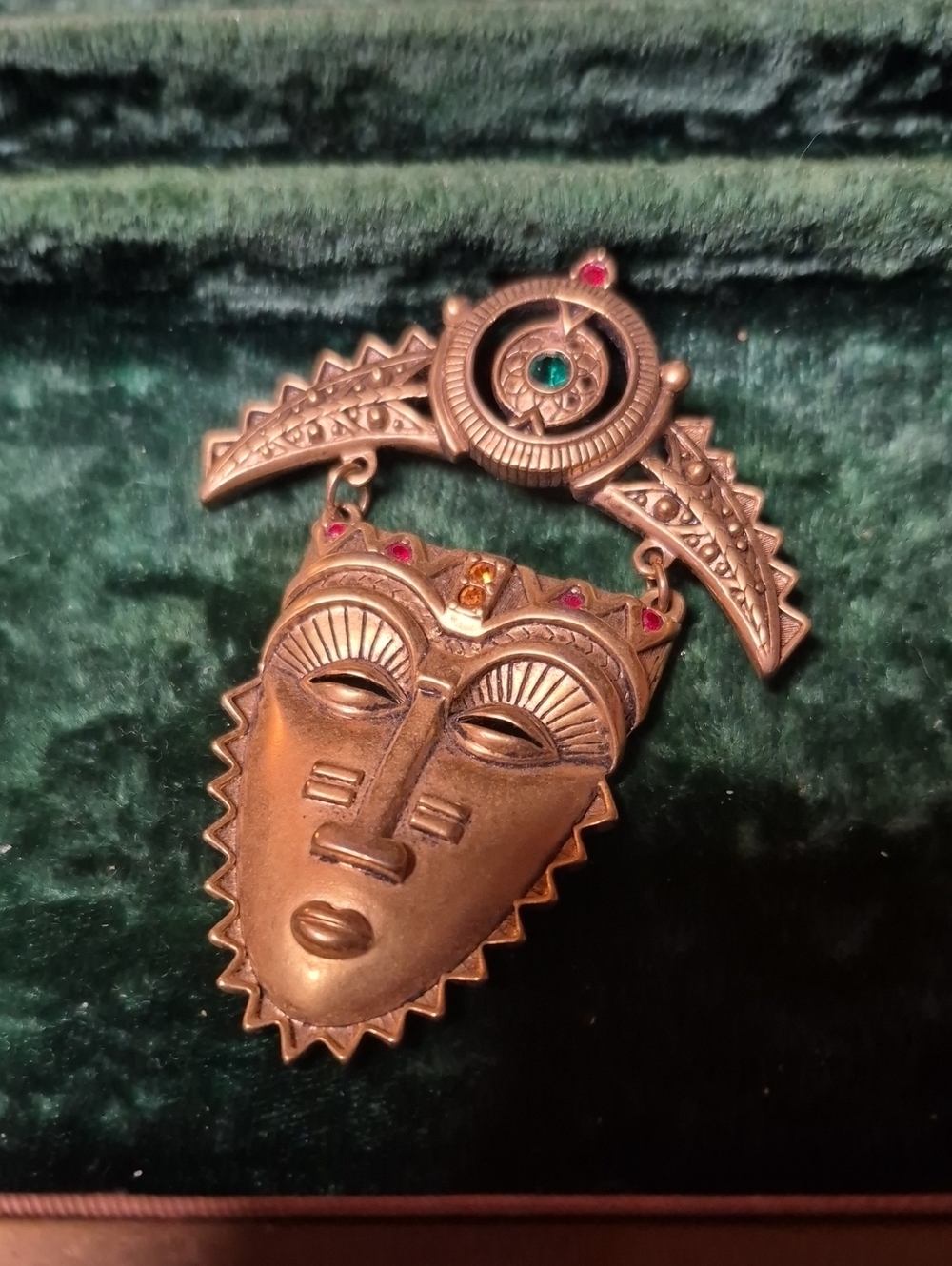 Vintage Avon Gold-Tone Tribal Mask Brooch with Green and Red Accents